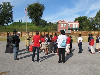 man speaking to students